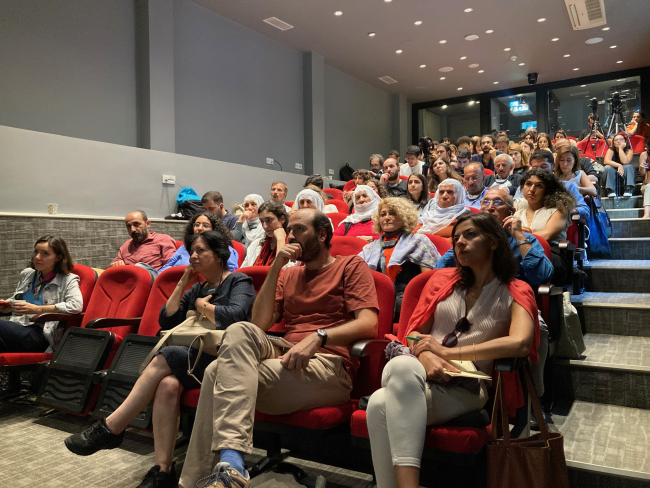 Audience members who attended the symposium in person.